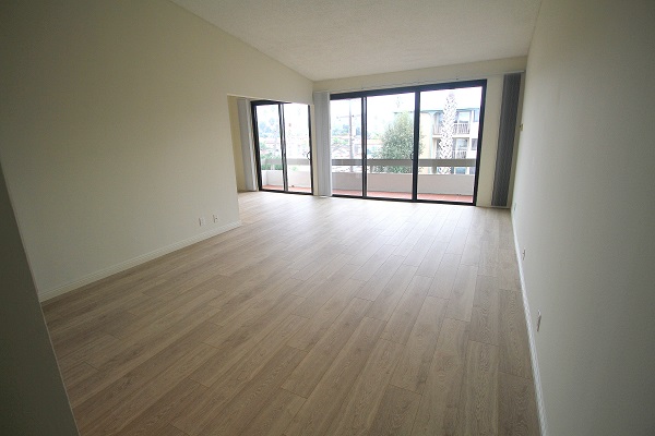 Huge Living room opening up to a large balcony Huge Living room opening up to a large balcony