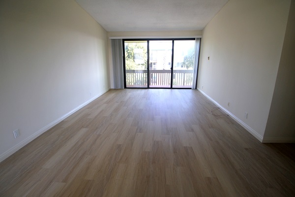 Huge Living room with high ceilings opening to large Balcony with Ocean and Palso Verdes Views