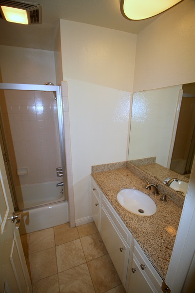 Bathroom with granite counter and Travertine floor Bathroom with granite counters and Travertine Floor