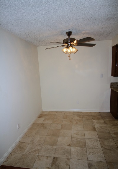 Dining room with Imported Travertine marble floor Dining room with imported Travertine Marble tile