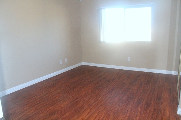 Large Bedroom with Hardwood Laminate Floor