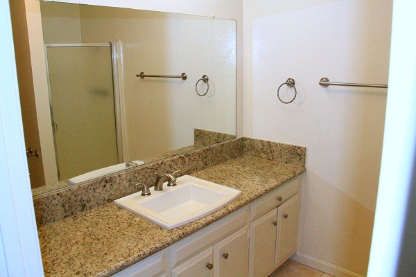 Second Full Bathroom with Granite Counters and Marble Floors