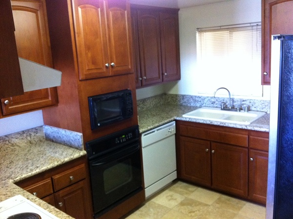 Kitchen with new Cherry Wood Cabinets, Imported Granite Counters and Marble Floors