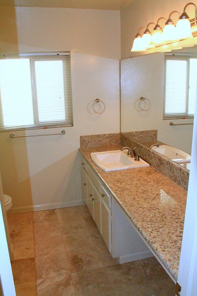 Very large main bath with make-up area, granite and marble and tub/shower
