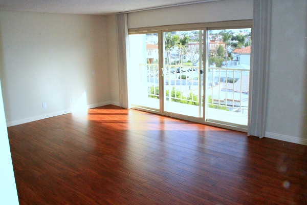 Huge living room with new hardwood laminate floor
