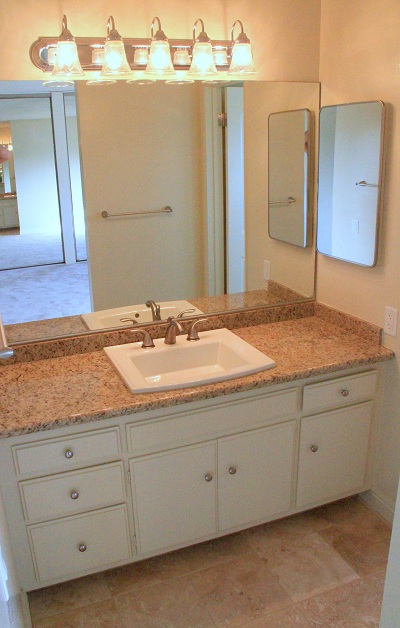 Master bath with seperate dressing area with granite and marble