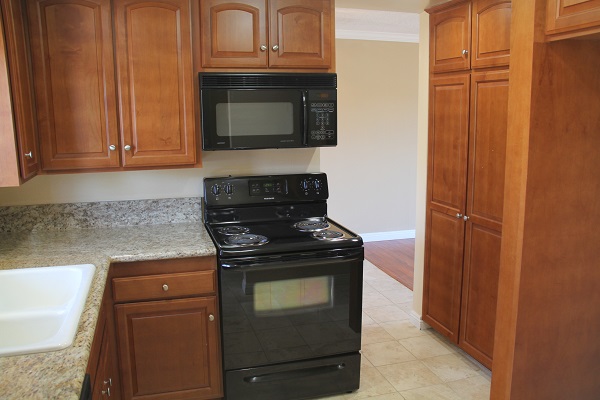 New Kitchen with Custom Cherry Wood Cabinets, Granite and marble