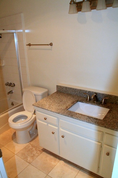 Upgraded bathrooms with granite and marble