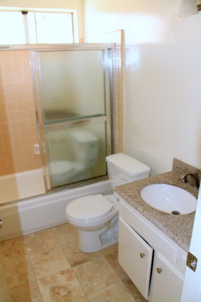 Upgraded bathrooms with granite and marble