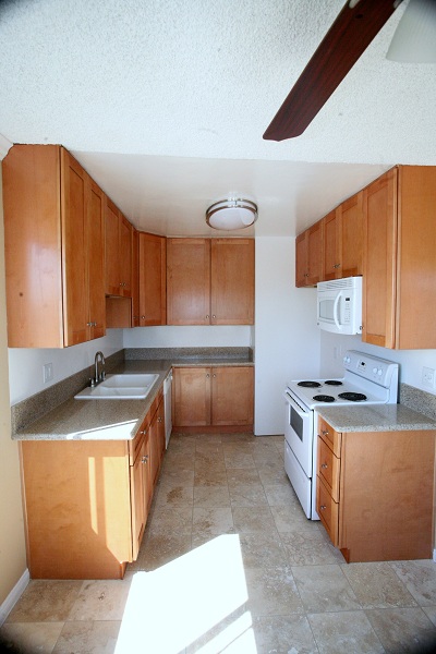 Kitchen with new cabinets, granite counters and marble floors