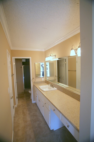 Large Master Suite Dressing Area with Granite Counter and Sink 