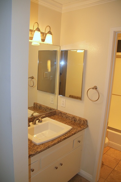 Full Bathroom with Imported Granite Tile and Travertine Marble Floor